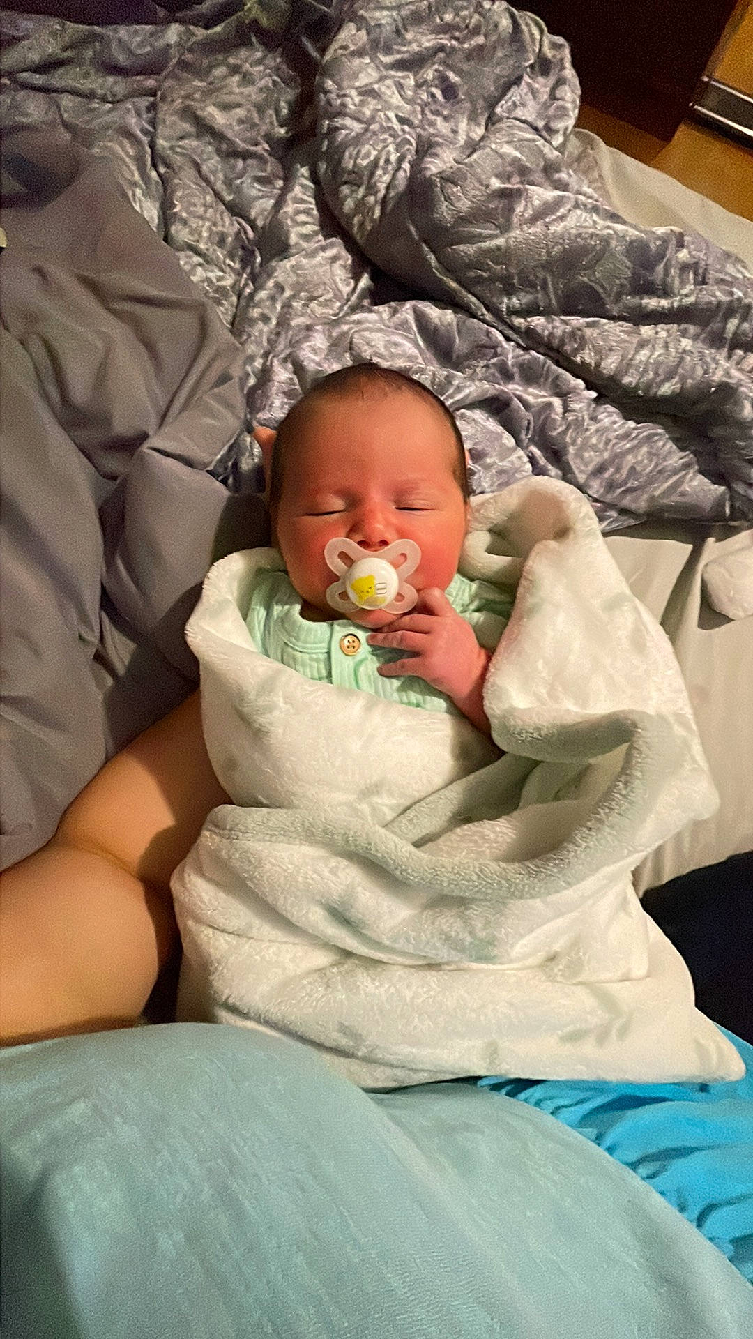 Riley joined the competition — help win amazing prizes! abdomen, baby, baby_products, baby_sleeping, baby_toddler_clothing, bedding, cheek, child, comfort, event, facial_expression, iris, linens, mouth, person, room, sitting, skin, stomach, toddler