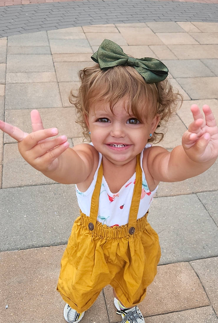 Leda joined the competition — help win amazing prizes! baby_toddler_clothing, child, costume, event, fashion_accessory, finger, fun, gesture, grass, hand, happy, headpiece, joy, leisure, party_supply, person, pink, play, skin, smile