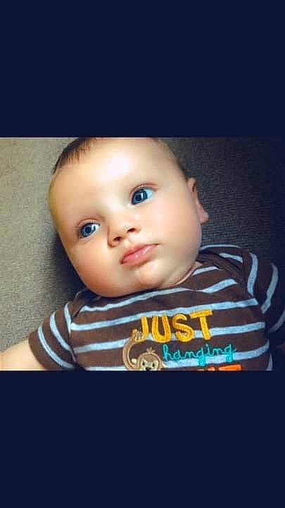 Kain is registered to the contest to win money with this photo: baby, cheek, child, chin, close_up, cool, eye, eyebrow, face, forehead, head, iris, lip, mouth, nose, person, photography, skin, sky, smile