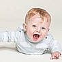 Rex is registered to the contest to win money with this photo: baby, child, blue_eyes, blonde_hair, sweater, cloud_pattern, happy, smiling, crawling, cute, infant, portrait, studio, white_background, clothing, person, young_child, joyful, expression, toddler