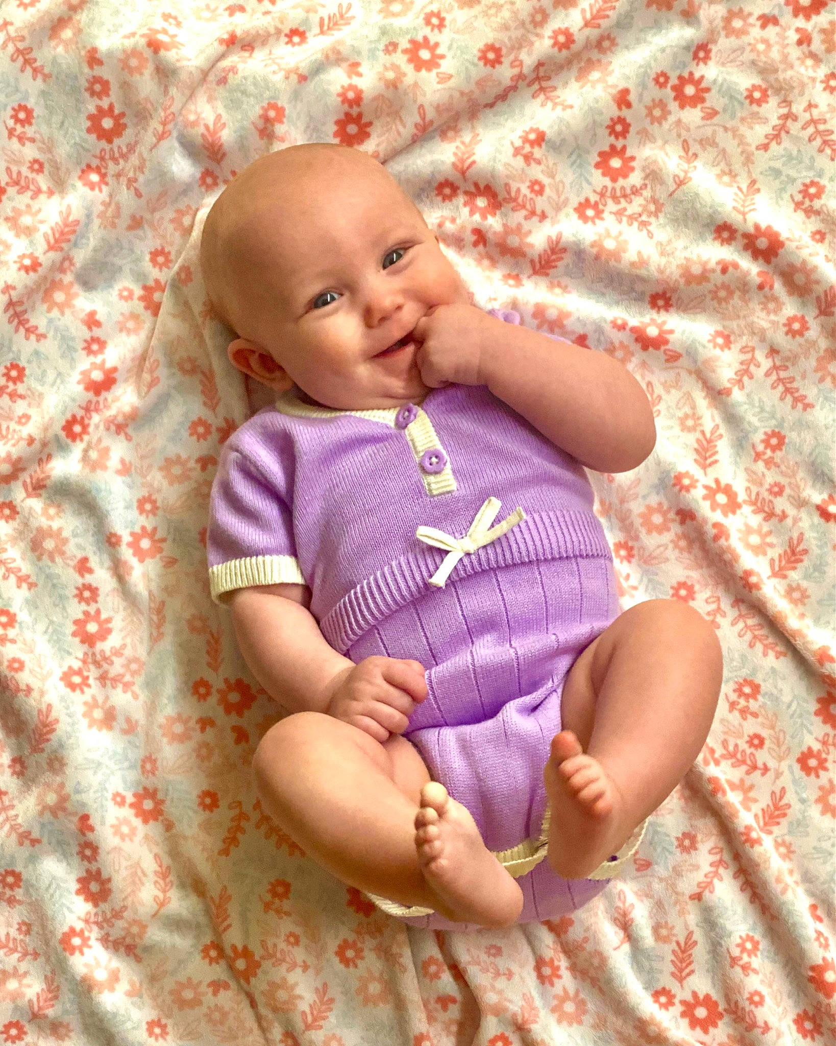 Adaline joined the competition — help win amazing prizes! baby, baby_toddler_clothing, cheek, comfort, eye, grass, happy, iris, linens, magenta, people_in_nature, person, pink, product, purple, skin, sleeve, smile, textile, toddler