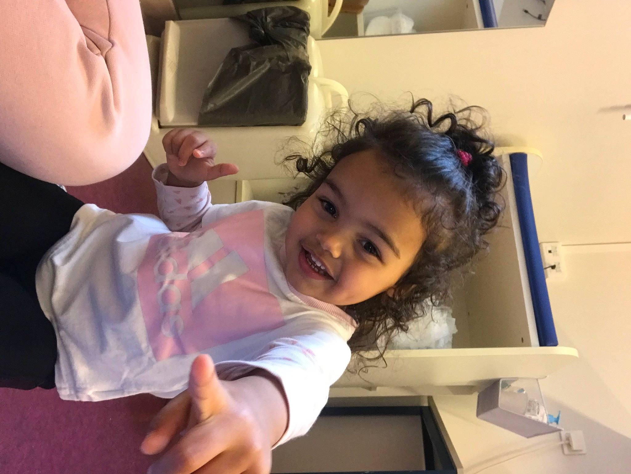 Mahéllya a rejoint le concours — aidez-le/la à gagner de superbes lots ! arm, baby, cheek, child, ear, event, eyelash, finger, fun, gesture, happy, iris, joy, mouth, nose, person, shoulder, skin, smile, thumb