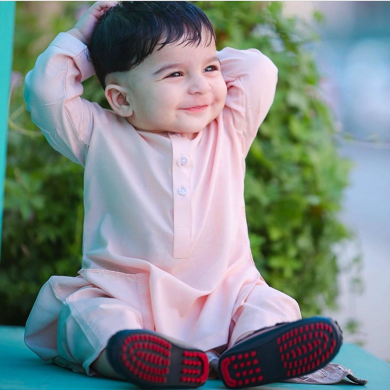 Aydin is registered to the contest to win money with this photo: baby, baby_products, baby_toddler_clothing, child, dress, flash_photography, fun, grass, happy, human_leg, joy, leisure, magenta, pattern, people_in_nature, person, pink, sitting, sleeve, smile