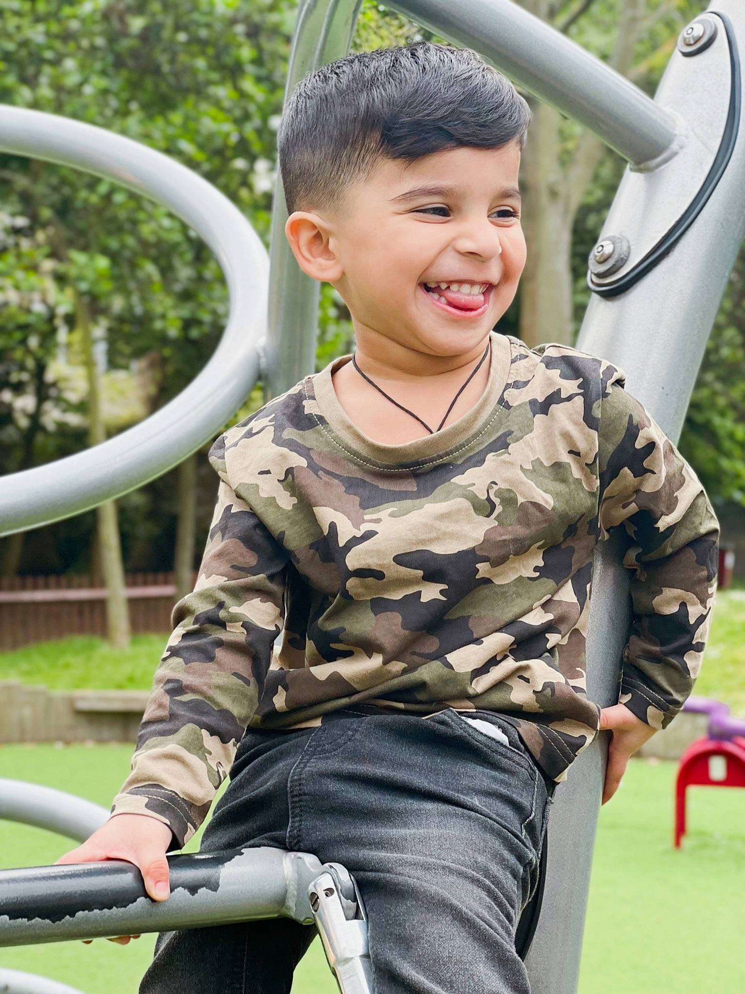 Aydin joined the competition — help win amazing prizes! child, face, facial_expression, fun, grass, green, happy, human_body, joy, leisure, person, photograph, plant, public_space, shirt, sleeve, smile, t_shirt, toddler, tree