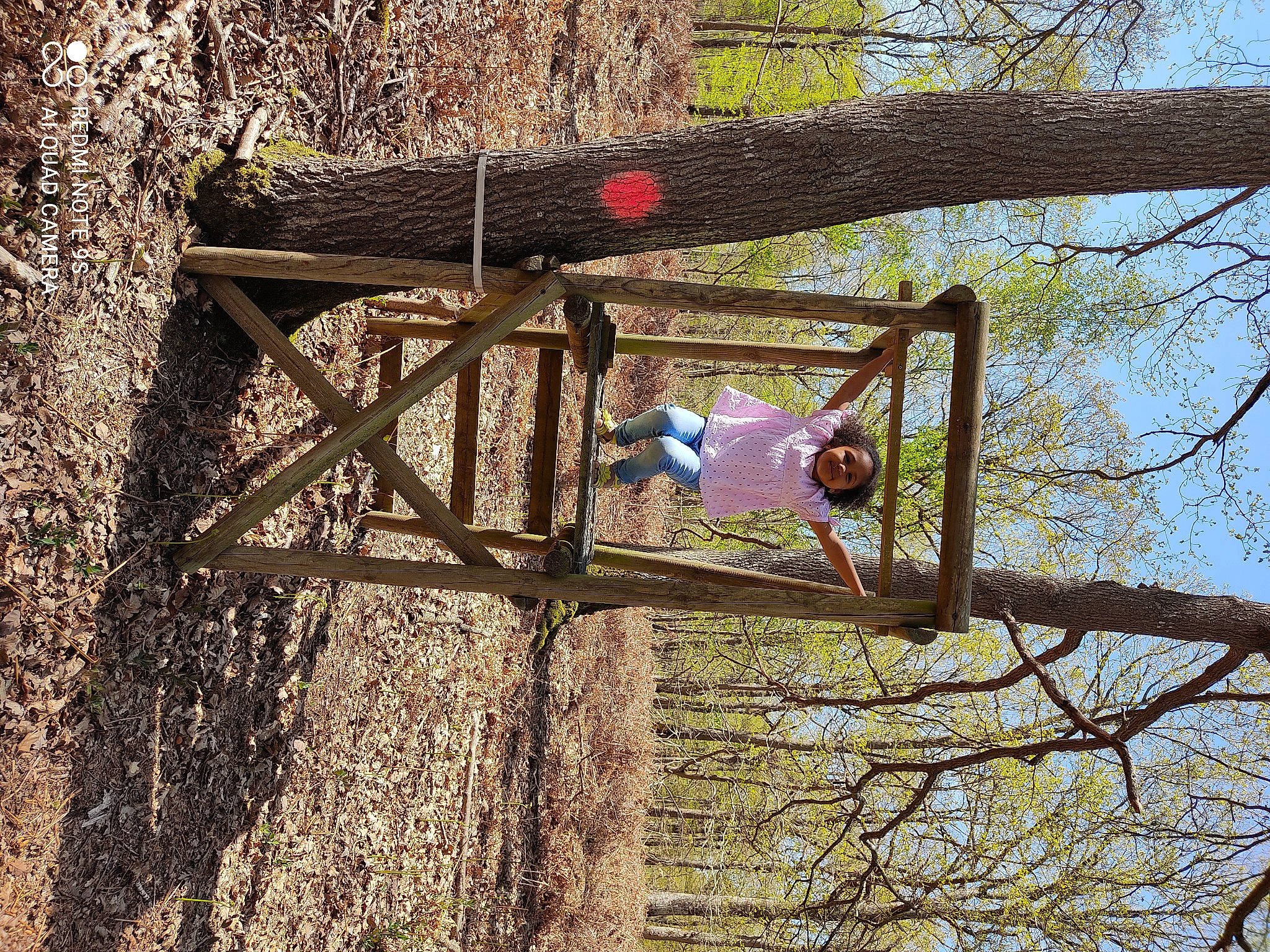 Tiana participe au concours pour gagner de l'argent avec cette photo : deciduous, fun, grass, house, joy, landscape, leisure, people_in_nature, person, plant, pole, recreation, shadow, sky, soil, spring, tints_and_shades, tree, trunk, twig