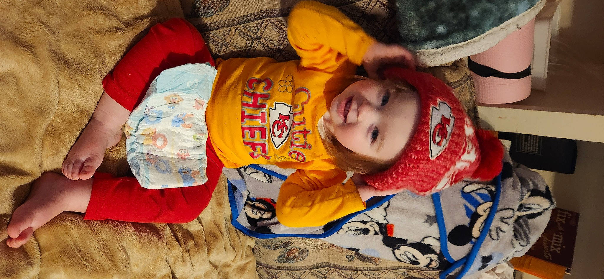 Layla R is registered to the contest to win money with this photo: baby, baby_toddler_clothing, cap, cheek, child, cool, fun, happy, hat, head, headwear, mouth, pattern, person, play, sitting, skin, sleeve, smile, sun_hat