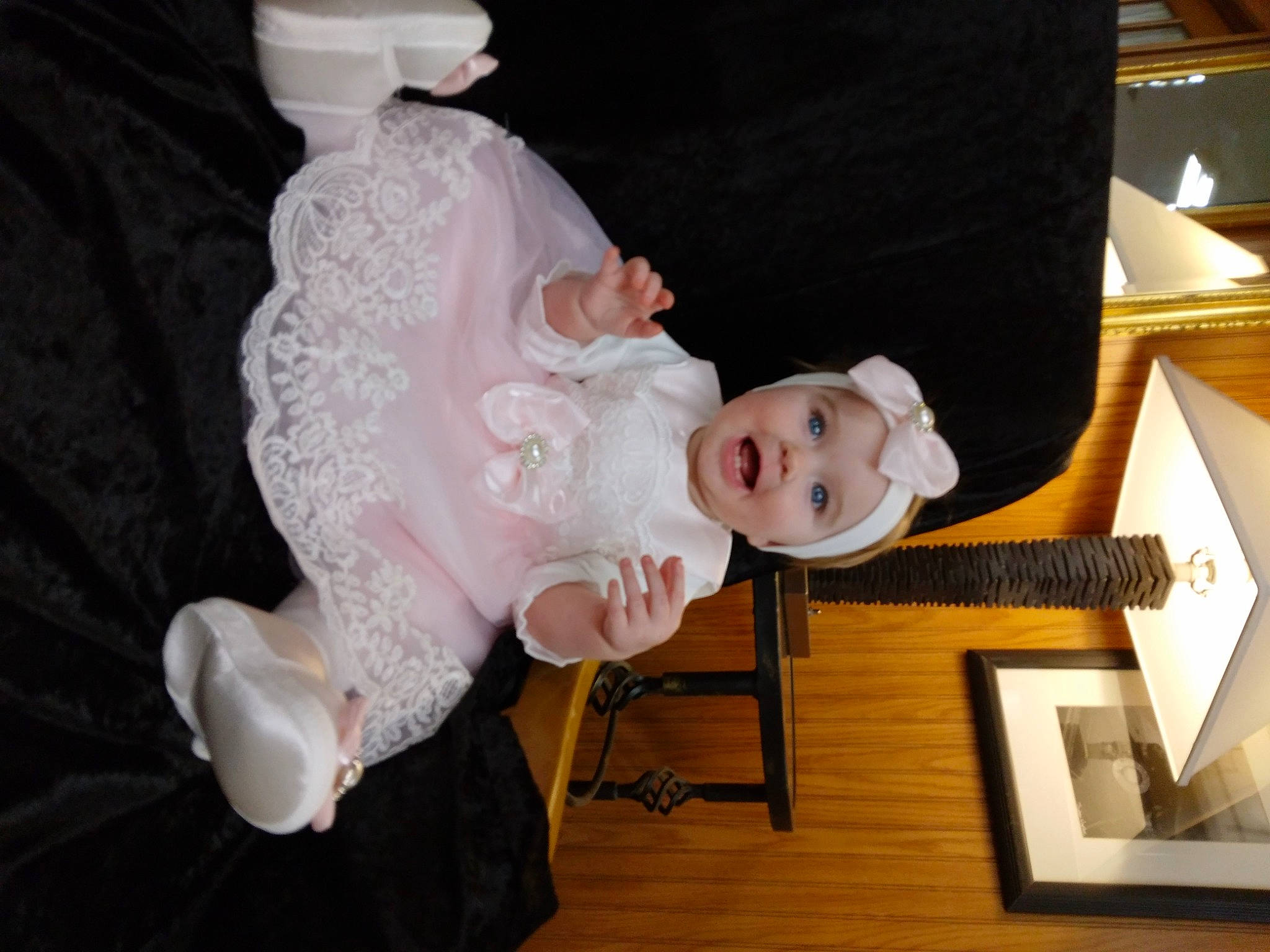 Layla joined the competition — help win amazing prizes! baby, baby_products, baby_toddler_clothing, cheek, child, costume, embellishment, event, flooring, fun, happy, headwear, human_body, person, room, sitting, smile, toddler, wood