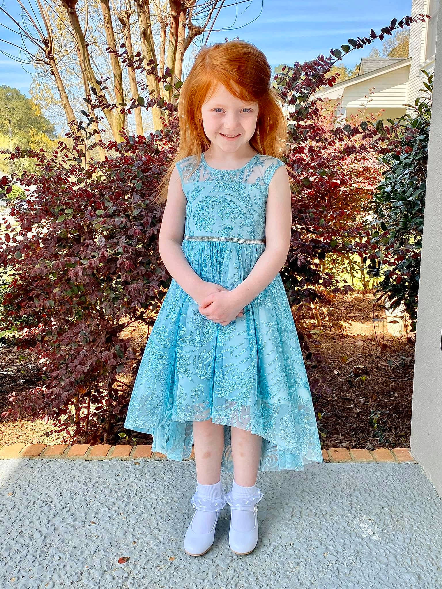 Paisley is registered to the contest to win money with this photo: a_line, aqua, blue, child, child_model, clothing, day_dress, dress, footwear, joy, pattern, person, pink, shoe, sleeve, toddler, turquoise, waist