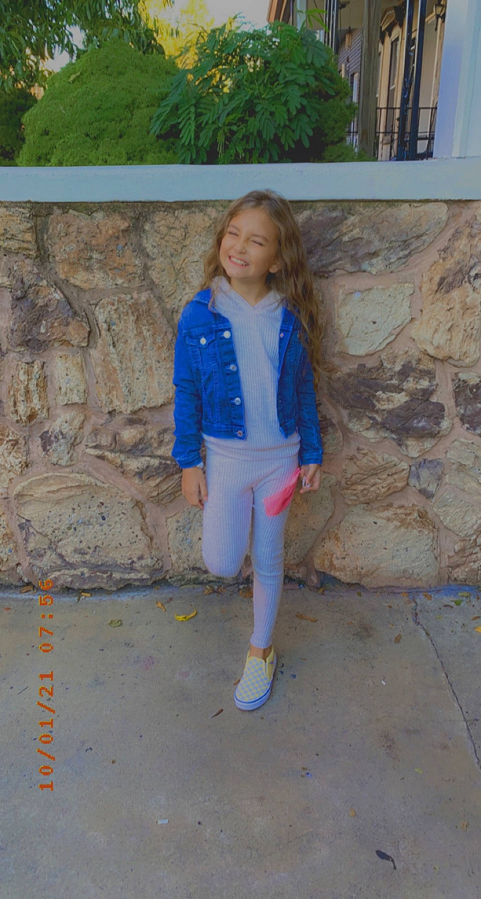 Emmalee joined the competition — help win amazing prizes! brown_hair, denim, electric_blue, fashion_accessory, fun, green, human_leg, joy, leisure, long_hair, pattern, person, recreation, rock, sleeve, sportswear, street_fashion, t_shirt, thigh, uniform