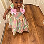 Janae joined the competition — help win amazing prizes! toddler, child, dress, pink_bow, pastel_colors, wooden_floor, hallway, door, expression, motion_blur, indoor, person, young_child, curly_hair, cute, surprised, standing, flooring, small_child, home