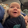 Lux joined the competition — help win amazing prizes! baby, infant, pacifier, blanket, couch, living_room, smile, child, person, hand, clothing, furniture, cozy, indoors, portrait, cute, happy, young, young_child, seated