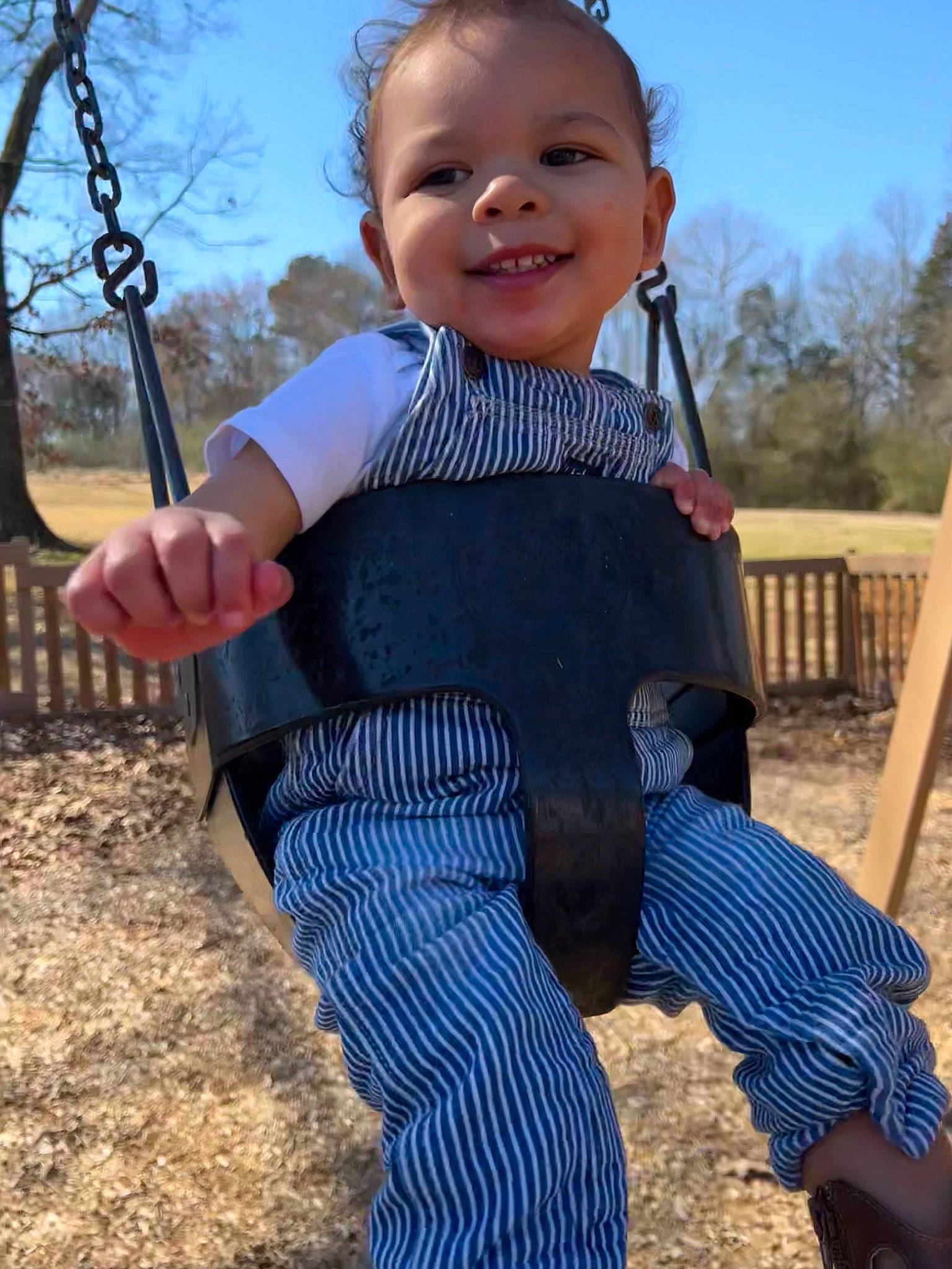 Jojo joined the competition — help win amazing prizes! baby_toddler_clothing, dress, electric_blue, face, fun, gesture, grass, hairstyle, happy, joy, leisure, people_in_nature, person, recreation, skin, sky, sleeve, smile, standing, swing