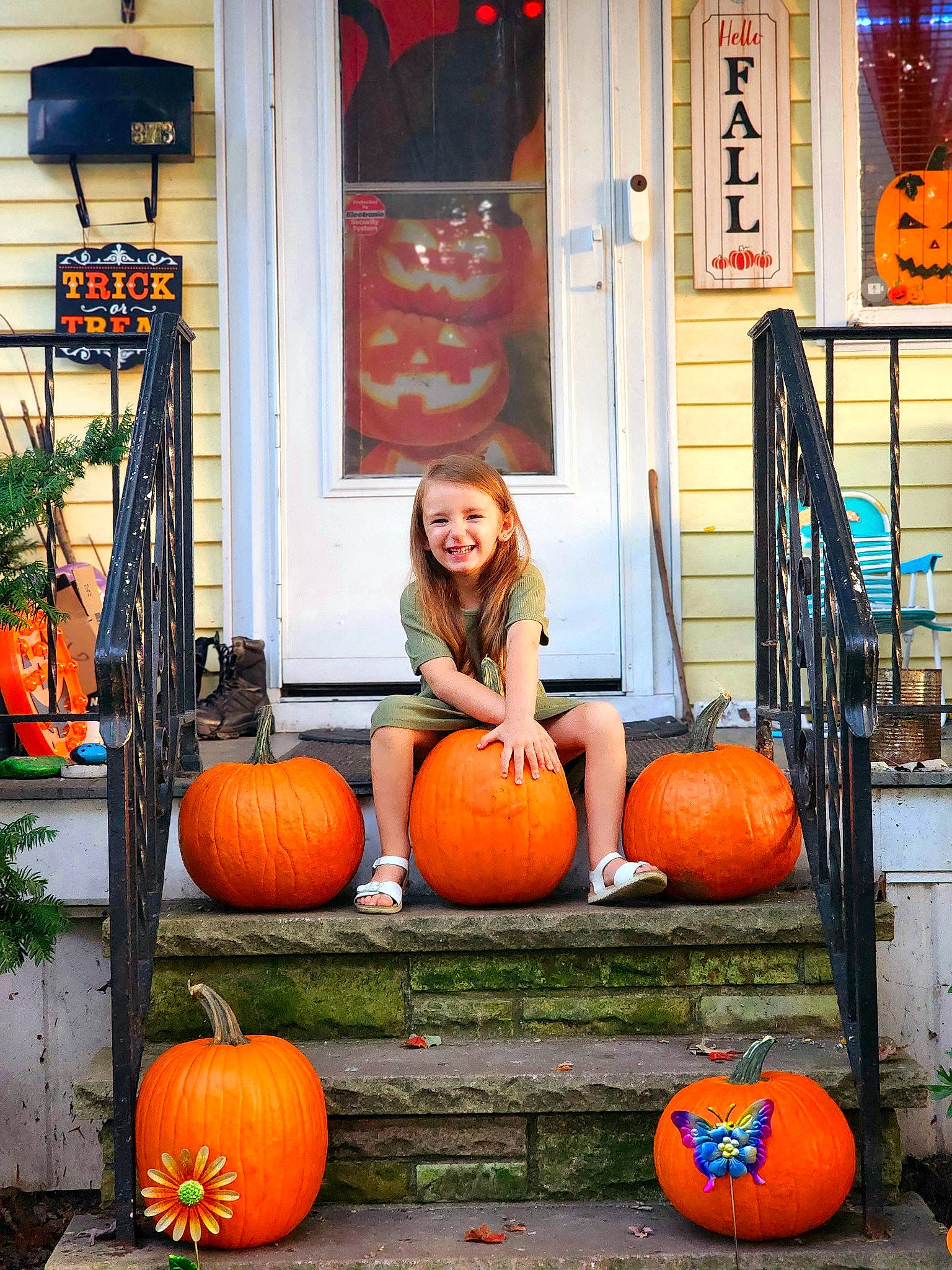 Mila joined the competition — help win amazing prizes! art, building, calabaza, cucurbita, door, flowerpot, fun, gourd, houseplant, joy, local_food, natural_foods, orange, people, person, plant, pumpkin, sitting, squash, vegetable