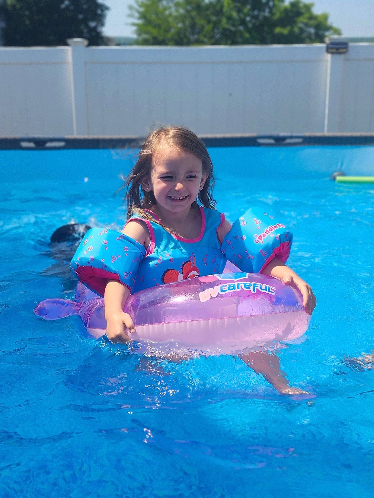 Mila joined the competition — help win amazing prizes! baby_float, bathing, child, fin, fish, fun, happy, inflatable, joy, leisure, leisure_centre, lifejacket, outdoor_recreation, person, personal_protective_equipment, recreation, sky, smile, swimming_pool, toddler