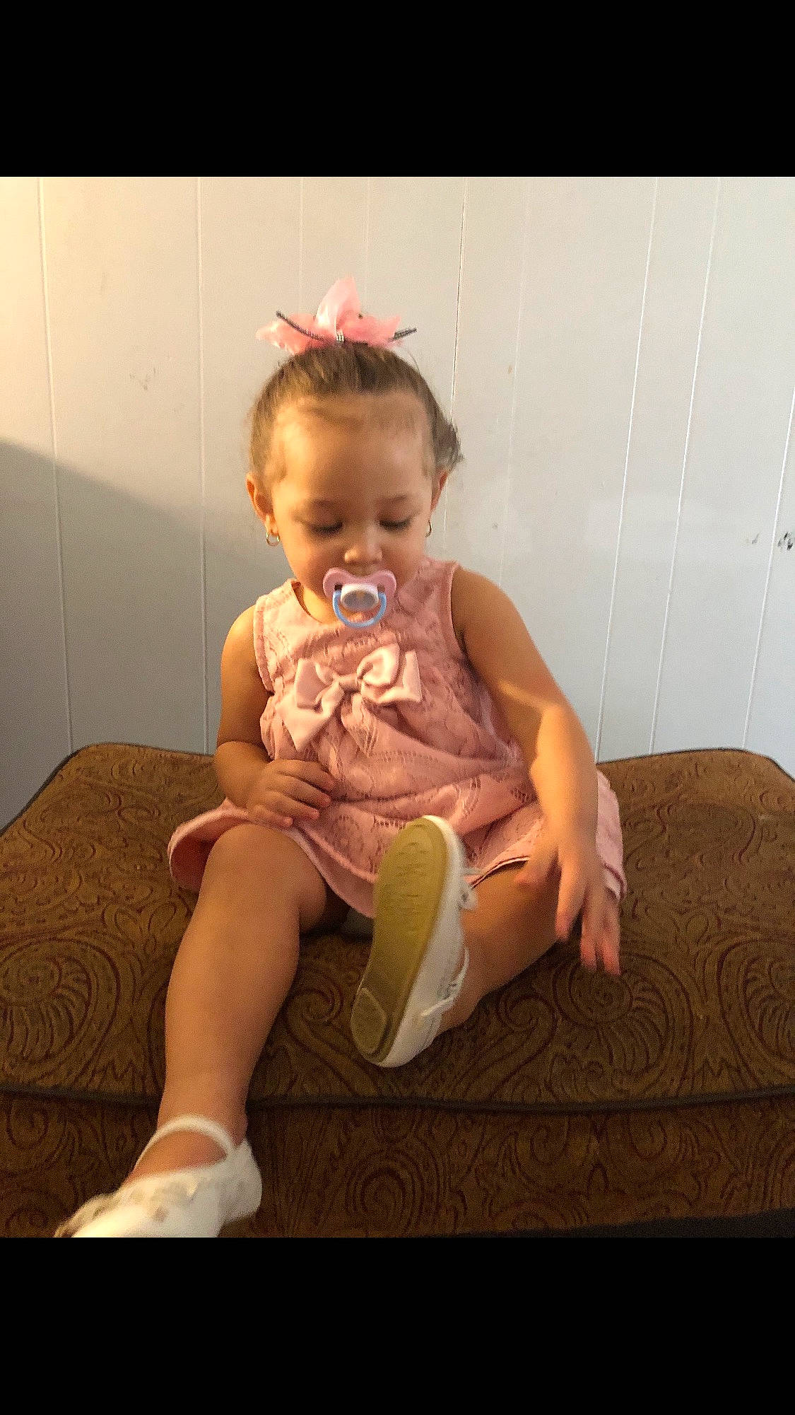 Dakotah is registered to the contest to win money with this photo: baby, child, ear, finger, hair_accessory, headband, person, sitting, toddler