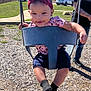 Kayloni joined the competition — help win amazing prizes! adult, casual_clothing, child, daylight, family, fun, grass, happiness, headband, outdoor, park, person, playground, recreation, smiling, sunny, support, swing, toddler, woodchips