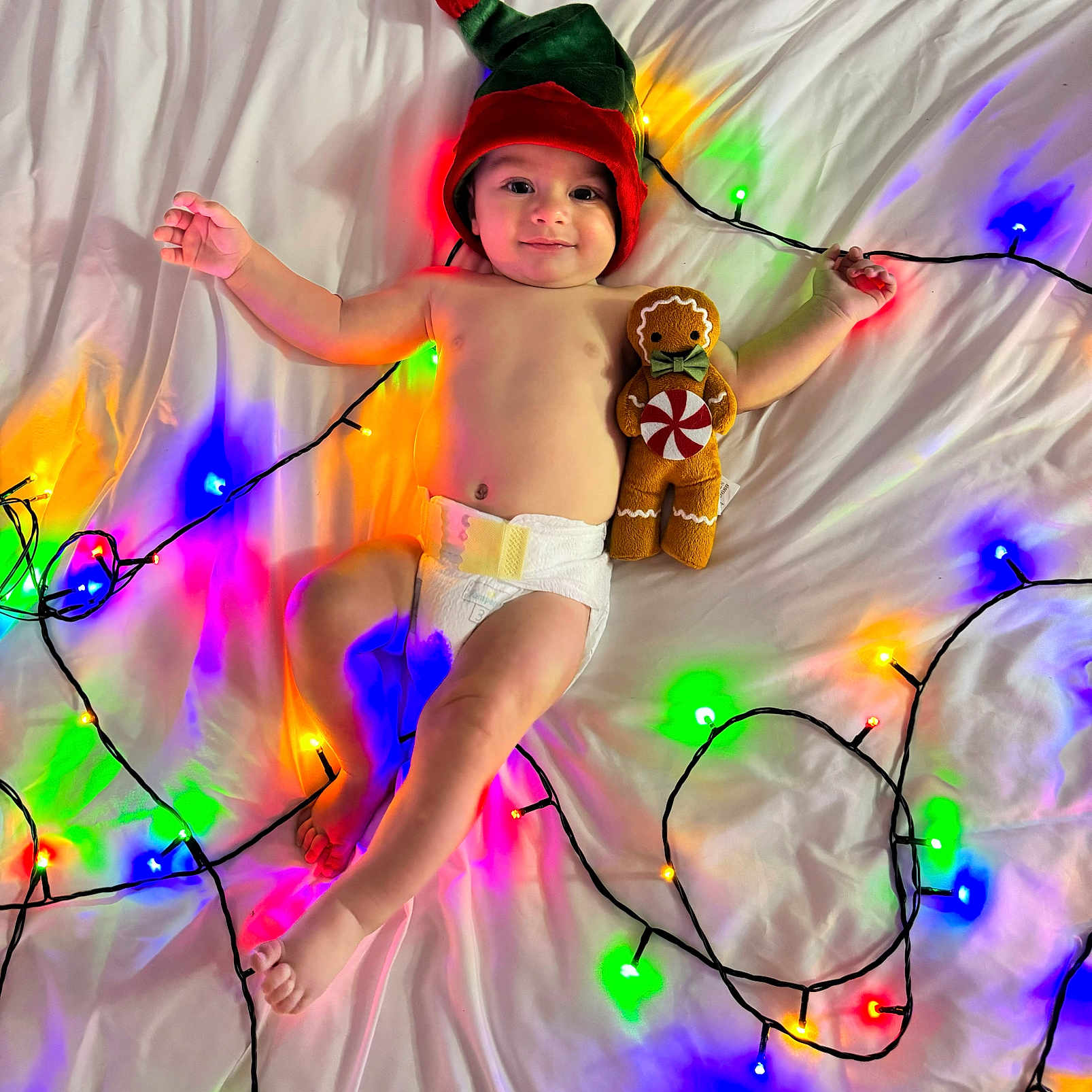 Cameron joined the competition — help win amazing prizes! baby, bodypart, clothing, costume, diaper, electricaldevice, electronics, face, finger, hand, hat, head, light, lighting, microphone, person, photography, portrait, purple, toy