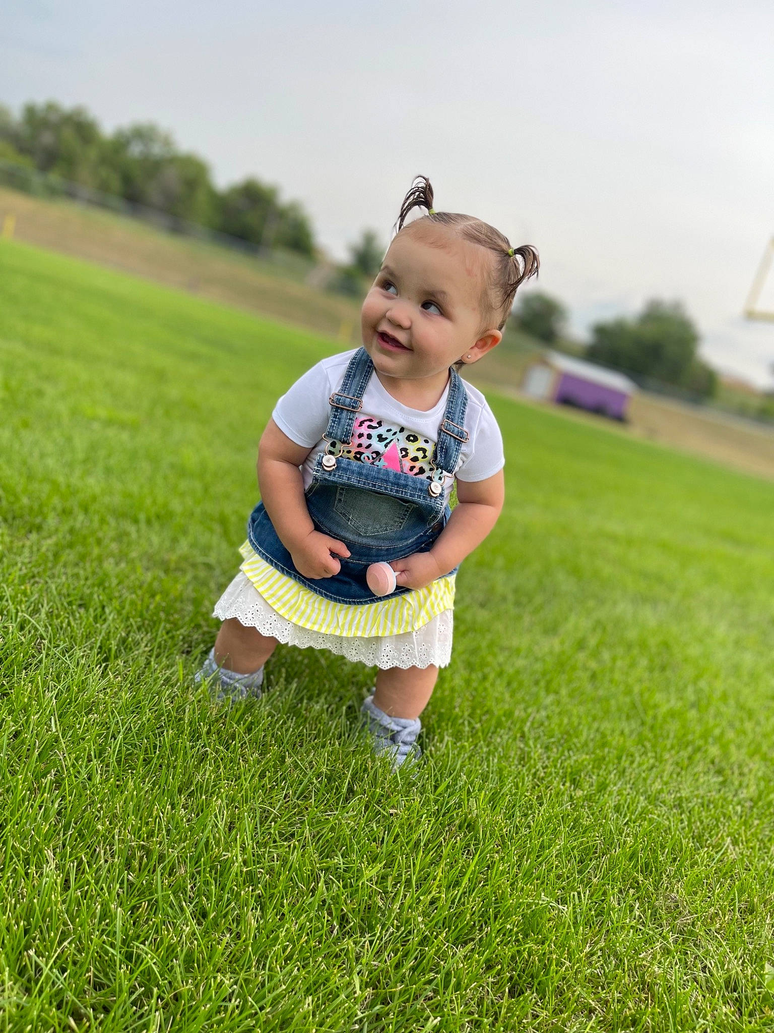 Acelyn joined the competition — help win amazing prizes! arm, baby, baby_toddler_clothing, ball, football, fun, grass, grassland, happy, joy, lawn, leisure, people_in_nature, person, plant, shoe, shorts, sky, smile, sneakers