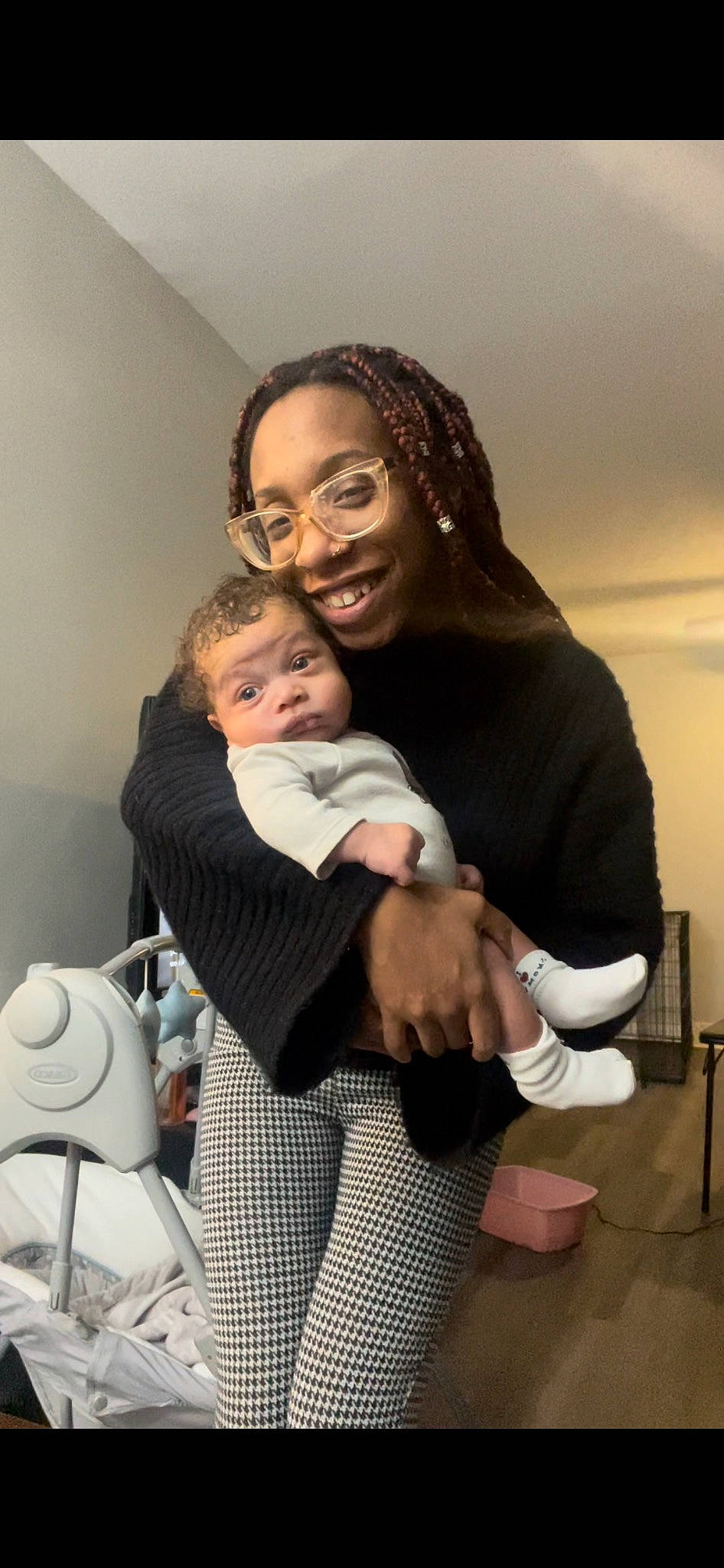 Jasiri is registered to the contest to win money with this photo: baby, child, comfort, event, eyewear, flash_photography, formal_wear, fun, gesture, glasses, happy, hug, joint, joy, person, room, shoulder, sitting, smile, standing