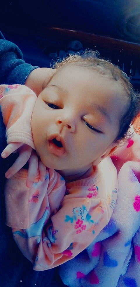 Railyn joined the competition — help win amazing prizes! baby, baby_toddler_clothing, cheek, child, chin, close_up, eyelash, face, facial_expression, finger, grass, happy, iris, lip, mouth, nose, person, pink, purple, skin