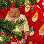 Finley joined the competition — help win amazing prizes! baby, sleeping, christmas_tree, christmas_clothing, red_blanket, santa_faces, holiday, festive, infant, greenery, lights, cute, indoors, holiday_season, toddler, soft_fabric, decorations, christmas, child, celebration
