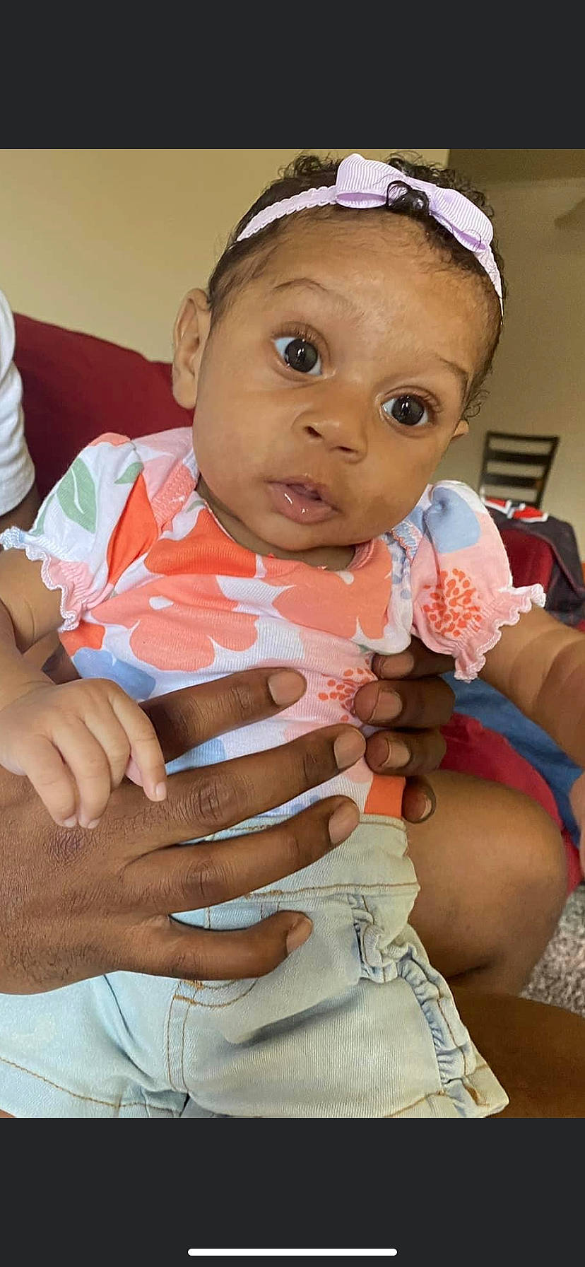 Kelani joined the competition — help win amazing prizes! baby_toddler_clothing, cheek, chin, eye, eyebrow, facial_expression, gesture, hairstyle, hand, happy, head, lip, mouth, nail, nose, person, pink, skin, surprise, thumb