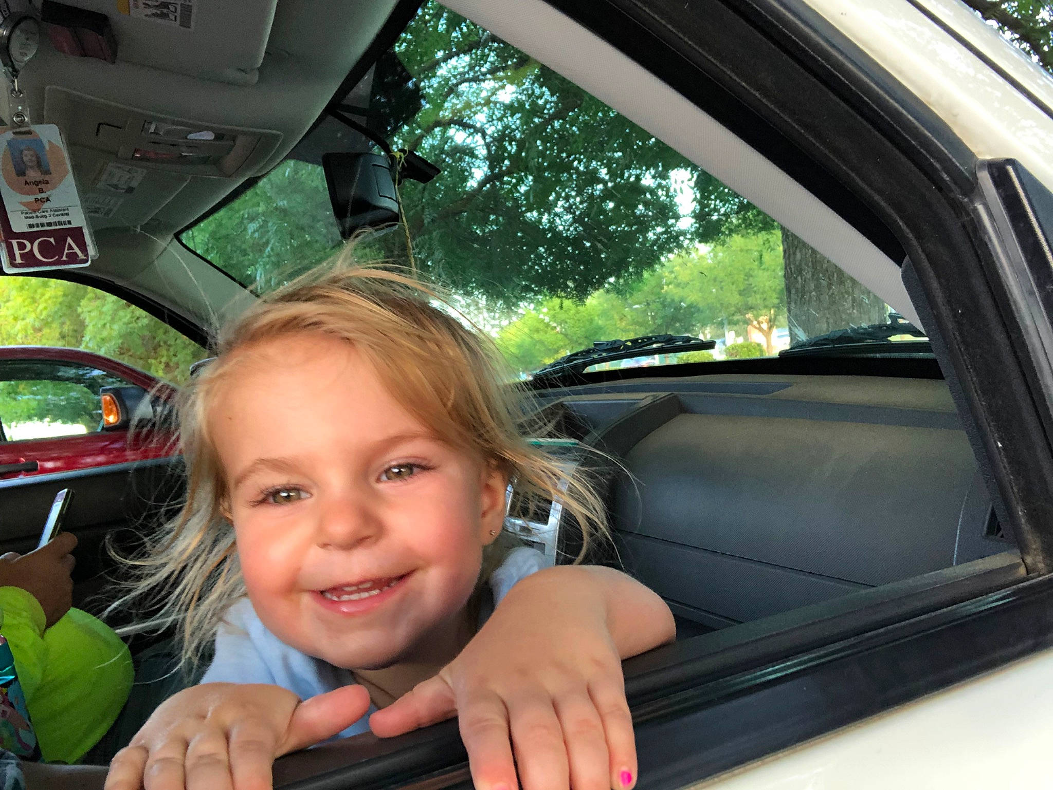 Baylynn joined the competition — help win amazing prizes! auto_part, automotive_exterior, automotive_mirror, automotive_window_part, car, car_seat, driving, family_car, glass, joy, person, rear_view_mirror, smile, steering_part, steering_wheel, vehicle, vehicle_door, windshield