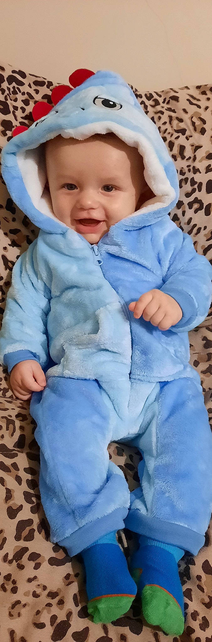 Corey joined the competition — help win amazing prizes! azure, baby, baby_toddler_clothing, blue, cheek, child, comfort, electric_blue, fashion_accessory, gesture, happy, headwear, linens, outerwear, pattern, person, sitting, skin, sleeve, smile