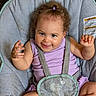 Wynter joined the competition — help win amazing prizes! toddler, child, baby_seat, curly_hair, purple_clothing, smile, happy, infant, cute, baby, straps, sitting, indoor, face, person, skin, arm, hand, clothing, seat