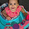 Wynter joined the competition — help win amazing prizes! baby, child, walker, pink_clothing, curly_hair, smiling, blue, purple, toy, play, indoor, happy, face, person, colorful, seat, hand, eyes, cute, infant