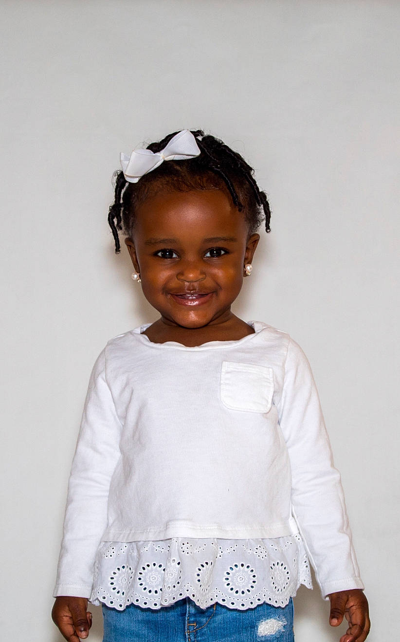 Joelle joined the competition — help win amazing prizes! baby_toddler_clothing, chin, clothing, day_dress, dress, face, facial_expression, fashion_design, flash_photography, gesture, hair, happy, head, headgear, human_body, iris, joy, neck, outerwear, person