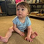 baby, child, infant, carpet, onesie, couch, woman, sofa, pillow, coffee_table, water_bottle, shoes, living_room, person, furniture, indoor, sitting, curious, home, casual