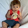 Beau joined the competition — help win amazing prizes! baby, infant, child, milestone_card, 8_months, sitting, blanket, clothing, red_shirt, blue_shorts, face, hands, feet, indoor, cute, portrait, soft_texture, winnie_the_pooh, curious, toddler
