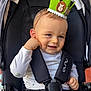 Maëlann participe au concours pour gagner de l'argent avec cette photo : baby, blue_eyes, car_seat, casual_clothing, child, close_up, crown, cute, green_crown, hand_on_face, happy, indoor, infant, lion_decoration, portrait, safety_harness, smile, stroller, white_shirt, young_child