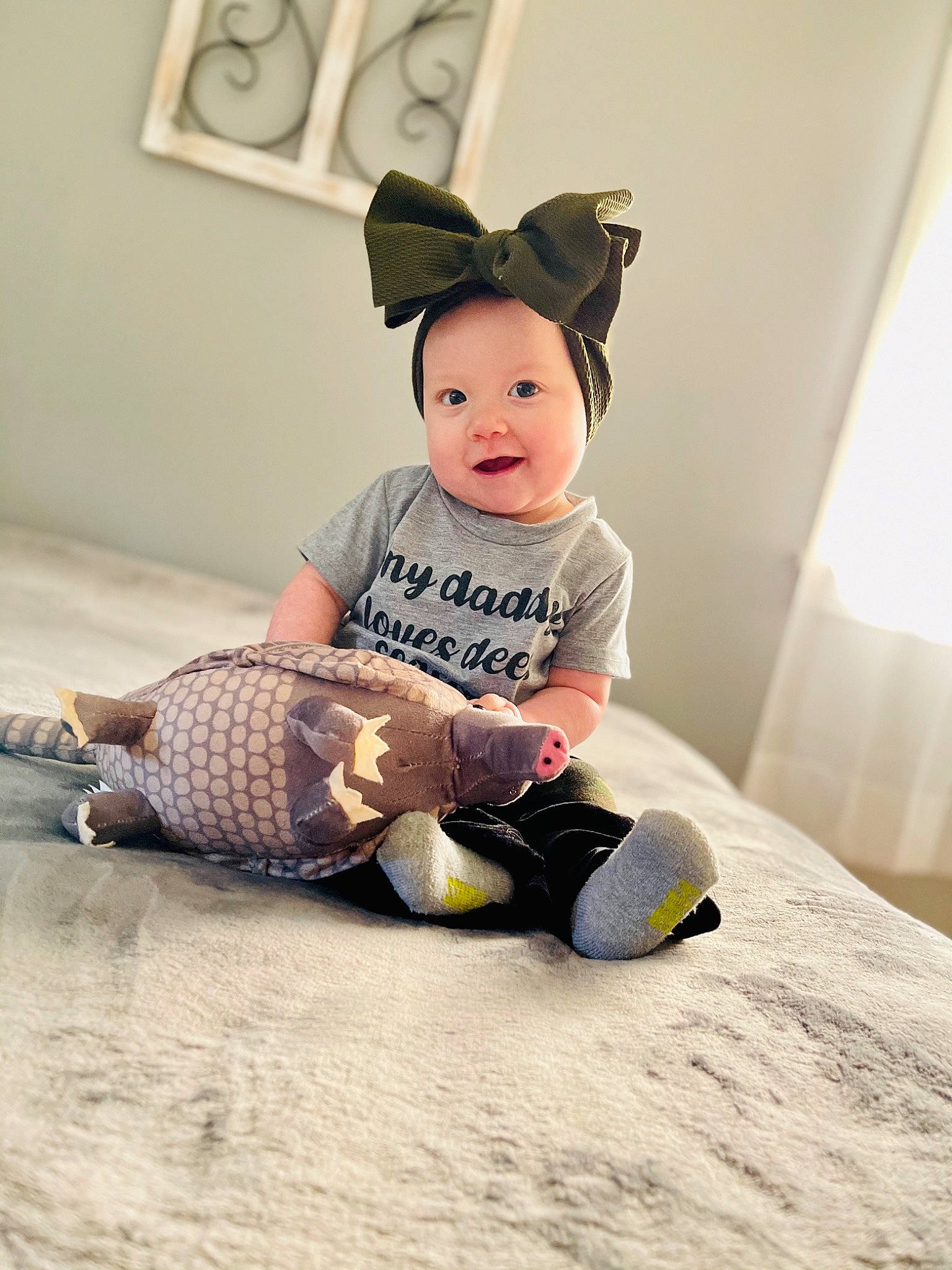 Ayla is registered to the contest to win money with this photo: baby, baby_products, baby_toddler_clothing, baby_toys, beanie, bonnet, costume_accessory, costume_hat, foot, human_body, overall, person, picture_frame, product, reptile, sock, stuffed_toy, toddler, toy