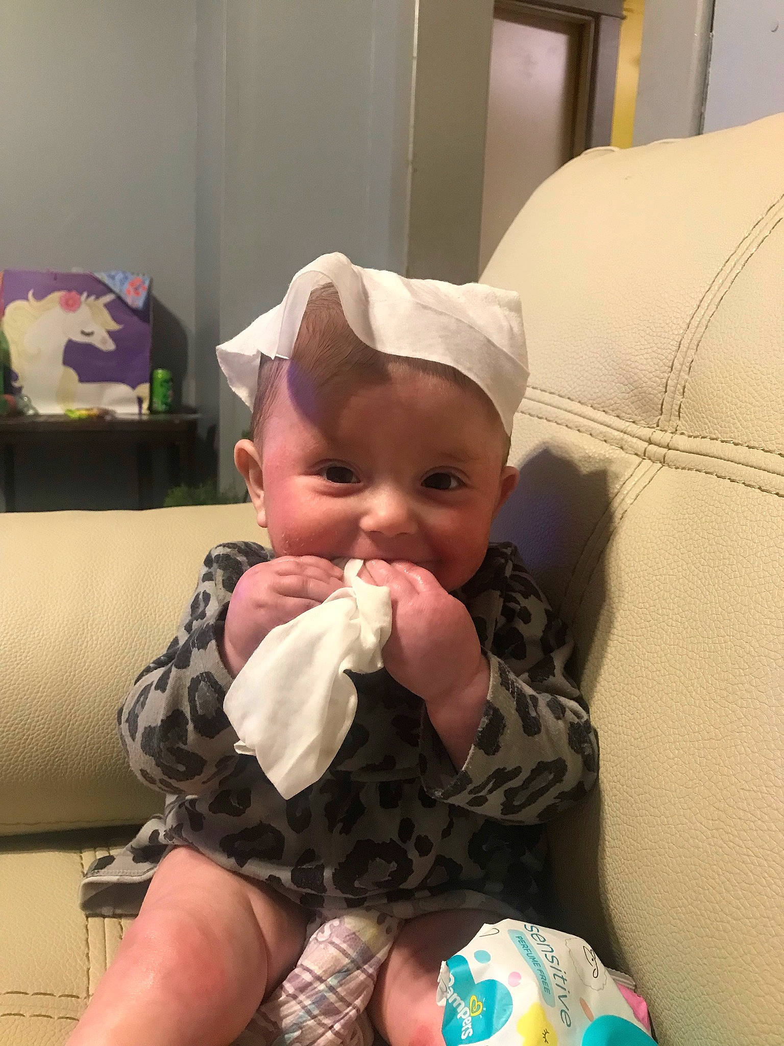 Piper joined the competition — help win amazing prizes! arm, baby, baby_toddler_clothing, cheek, comfort, couch, eye, finger, fun, happy, human_leg, iris, lap, mouth, person, sitting, skin, sock, thigh, thumb