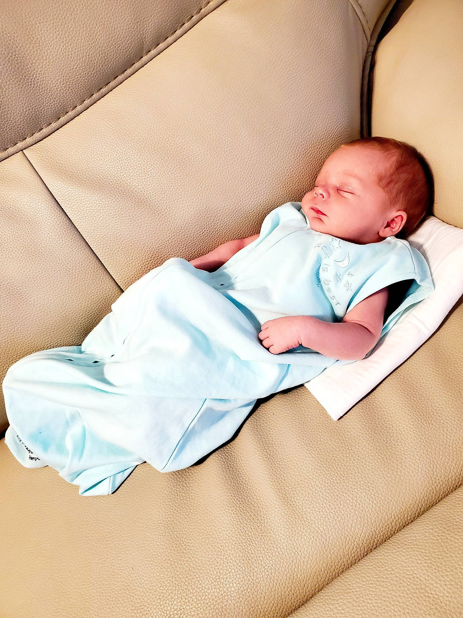 Jayce joined the competition — help win amazing prizes! baby, baby_products, baby_sleeping, baby_toddler_clothing, child, collar, comfort, couch, human_leg, linens, person, portrait_photography, room, sitting, sleep, sleeve, sock, throw_pillow, toddler