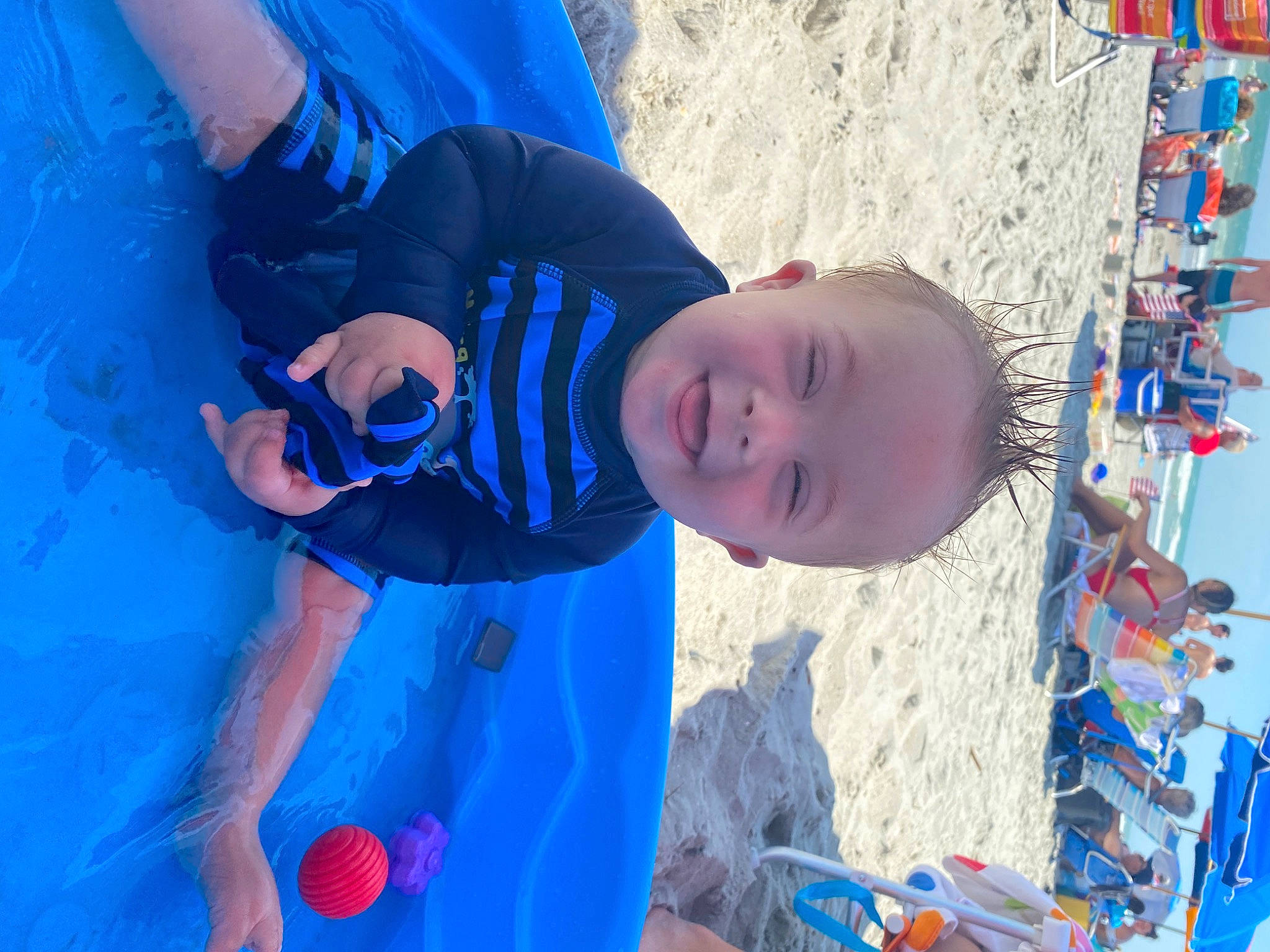 Lincoln joined the competition — help win amazing prizes! azure, baby, baby_toddler_clothing, beach, blue, child, electric_blue, fun, happy, leisure, person, play, recreation, sand, smile, t_shirt, toddler, travel, vacation, water