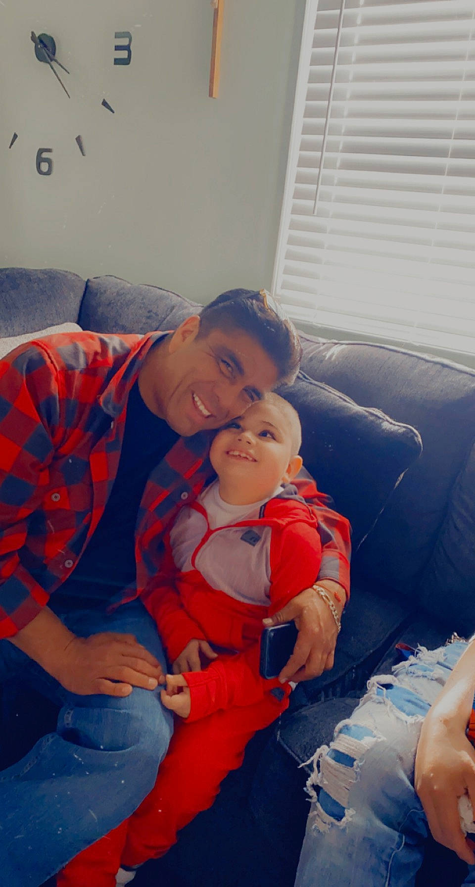 Cruz joined the competition — help win amazing prizes! arm, baby, child, comfort, couch, finger, fun, hairstyle, hand, happy, joy, lap, leg, mouth, person, sitting, smile, t_shirt, toddler, trunk