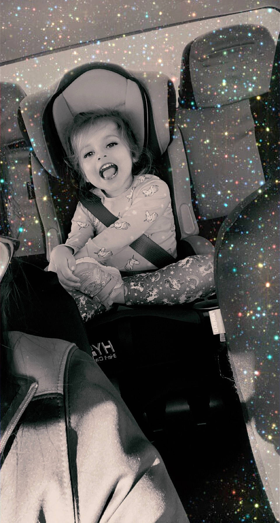 Marlaynee is registered to the contest to win money with this photo: auto_part, automotive_design, baby_carriage, baby_products, black_and_white, car_seat, chair, child, comfort, flash_photography, fun, happy, monochrome, monochrome_photography, motor_vehicle, pattern, person, sitting, smile, style