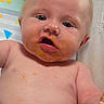 baby, food, messy, face, blue_eyes, skin, mouth_open, infant, highchair, expression, feeding, child, cute, chubby, indoor, young, plump, closeup, pink_skin, curious