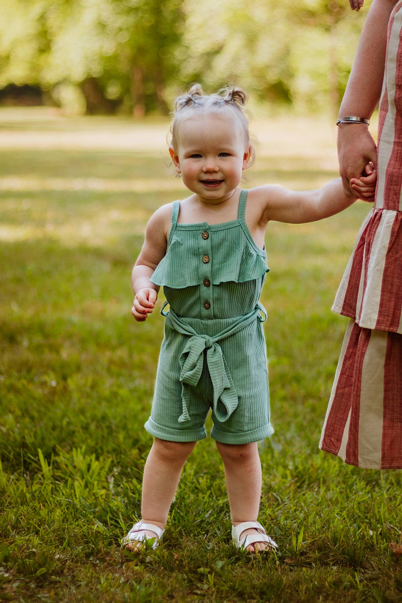Addy is registered to the contest to win money with this photo: baby, baby_toddler_clothing, child, event, fun, gesture, grass, grass_family, grassland, happy, joy, lawn, leisure, mammal, meadow, people_in_nature, person, plant, recreation, smile