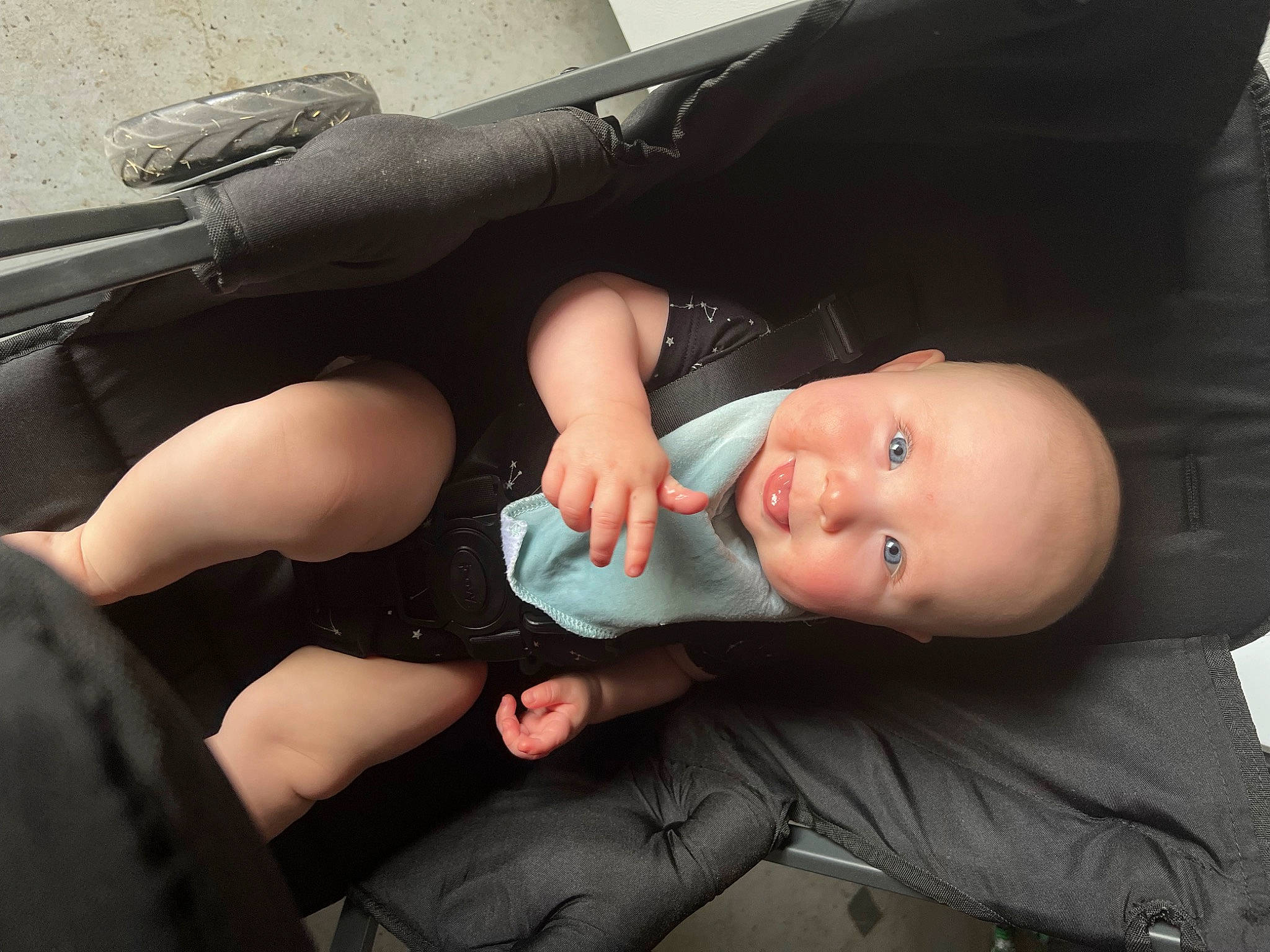 Colten is registered to the contest to win money with this photo: auto_part, automotive_exterior, baby, baby_carriage, baby_products, baby_toddler_clothing, car_seat, child, comfort, finger, fun, gesture, human_leg, nail, person, sitting, thigh, thumb, toddler, vehicle_door