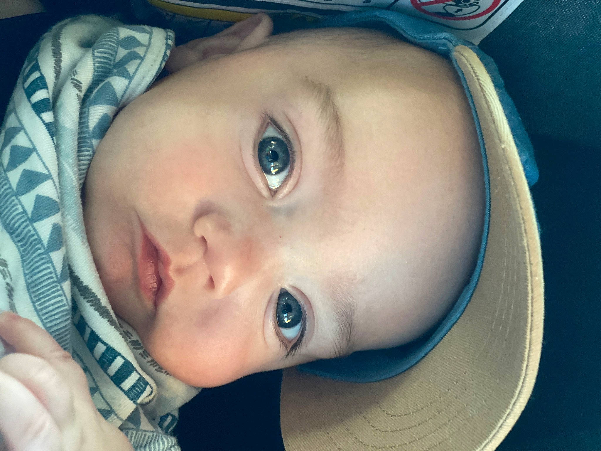 Koen is registered to the contest to win money with this photo: azure, baby, blue, cheek, chin, ear, eye, eyebrow, eyelash, face, forehead, head, headgear, iris, lip, mouth, neck, nose, person, skin
