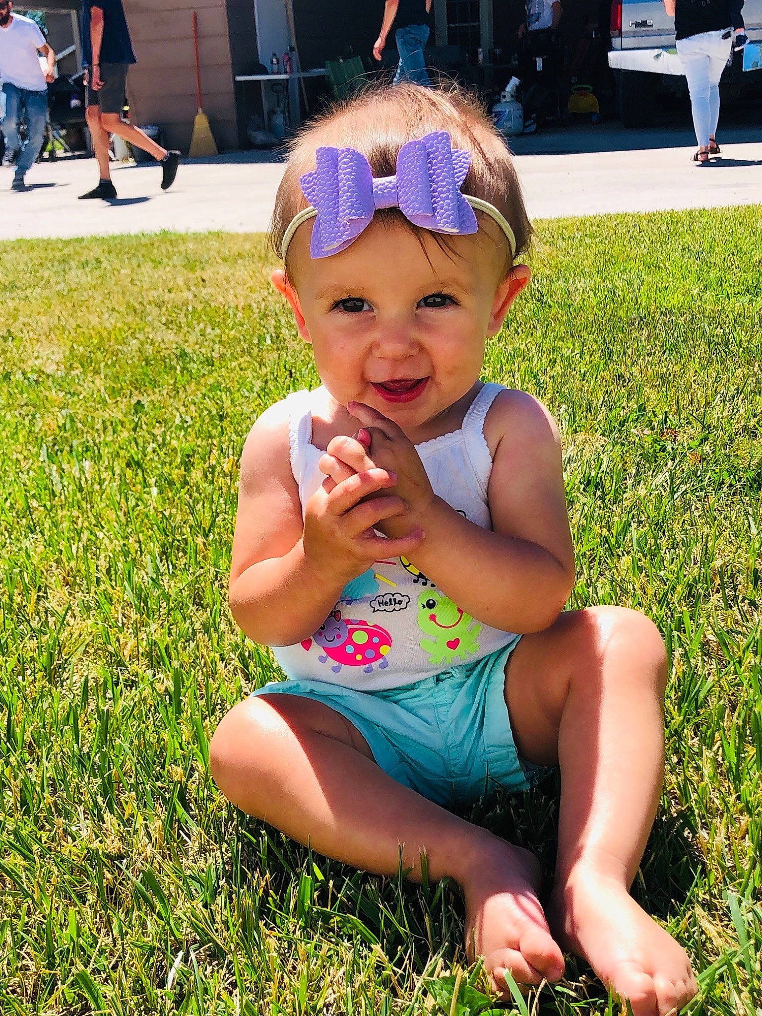 Bexlee is registered to the contest to win money with this photo: baby, child, fun, grass, grass_family, headgear, headwear, lawn, meadow, person, plant, play, sitting, summer, toddler, vacation