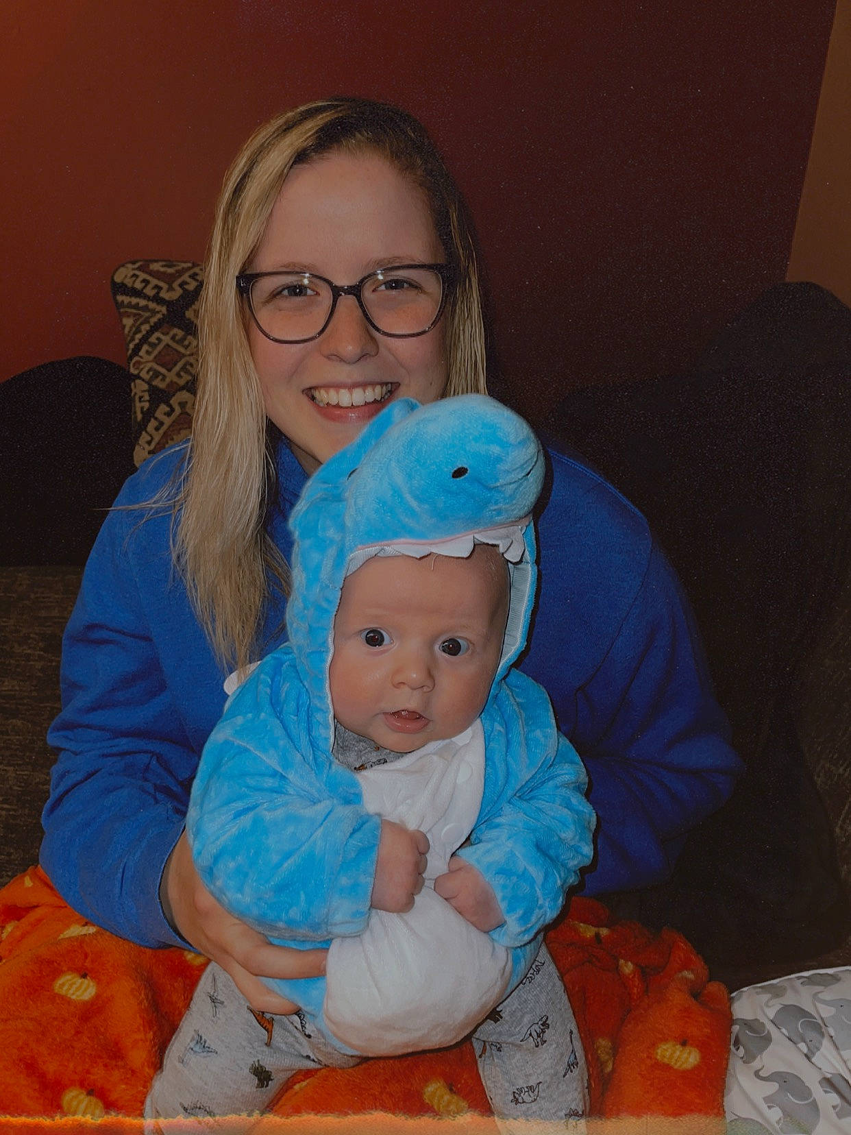 Lincoln is registered to the contest to win money with this photo: baby, baby_toddler_clothing, cap, cheek, child, comfort, event, eyewear, face, fun, glasses, happy, head, headwear, iris, joy, lap, organ, person, sitting