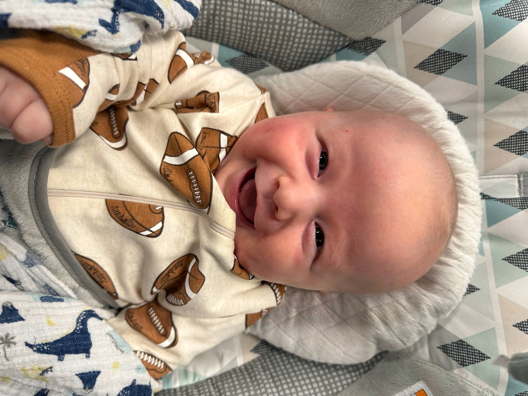 Lincoln joined the competition — help win amazing prizes! baby, baby_laughing, baby_products, baby_toddler_clothing, cheek, child, comfort, eye, eyelash, flooring, fun, happy, linens, nose, pattern, person, room, skin, smile, toddler