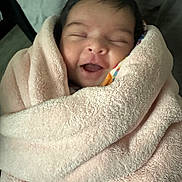 Izabella joined the competition — help win amazing prizes! baby, blanket, child, closed_eyes, comfort, cozy, cute, happy, head, indoor, infant, newborn, person, portrait, skin, smiling, soft_texture, towel, warm, wrapped