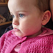 Eliza joined the competition — help win amazing prizes! toddler, child, face, profile, blue_eyes, pink_sweater, knitted_clothing, indoor, soft_lighting, shelf, stuffed_animals, cute, portrait, young_child, baby, person, closeup, serious, looking_away, warm_clothing