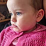 toddler, child, face, profile, blue_eyes, pink_sweater, knitted_clothing, indoor, soft_lighting, shelf, stuffed_animals, cute, portrait, young_child, baby, person, closeup, serious, looking_away, warm_clothing